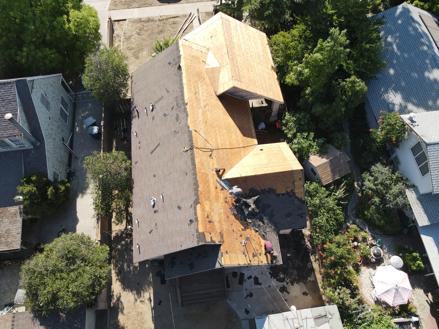 Tear-off on a Fresno roof exposes the decking condition