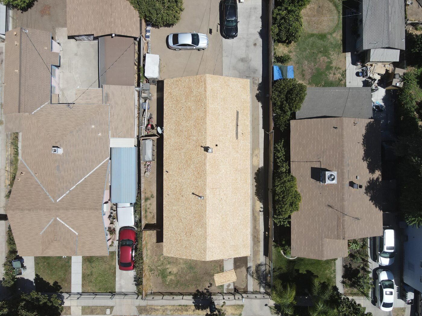 A Fresno roof re-sheeted with new decking during replacement
