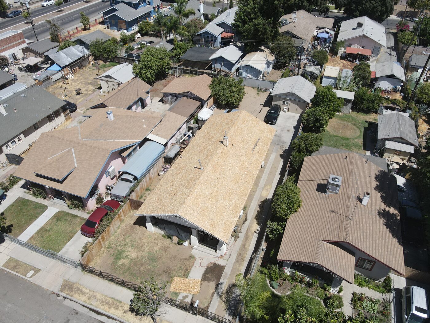 Aerial view of the bungalow with brand-new roof decking installed edge to edge