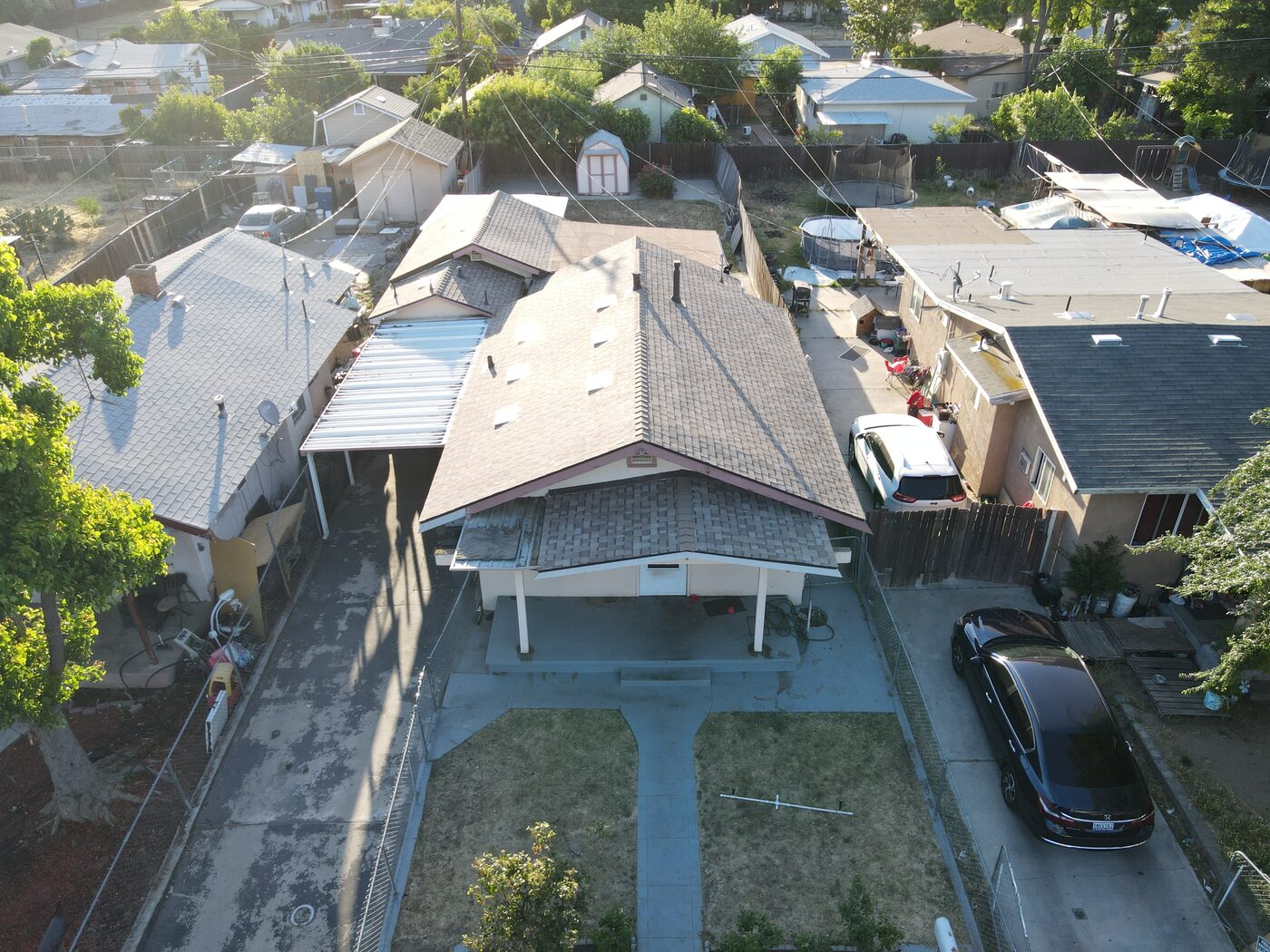 New shingle roof on a Fresno, CA single-story home, aerial view