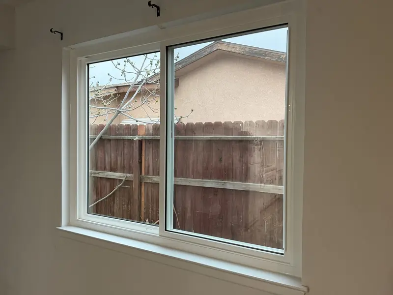 New white vinyl window on a stucco home in Fresno, CA