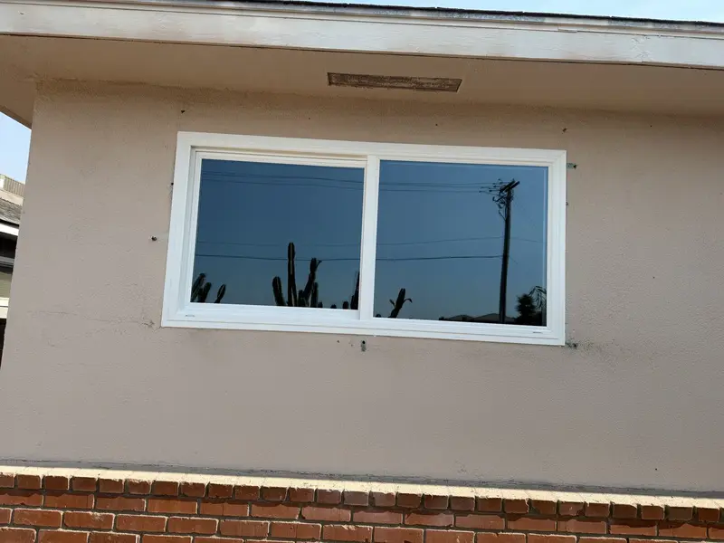 Replacement white vinyl window after upgrading old windows in Fresno, CA